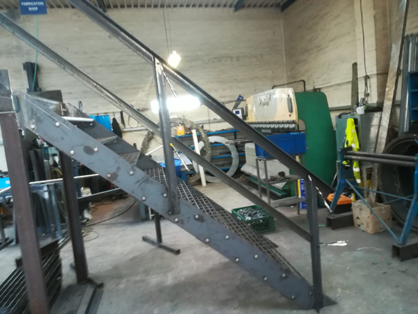 Industrial Staircase with Grated Treads